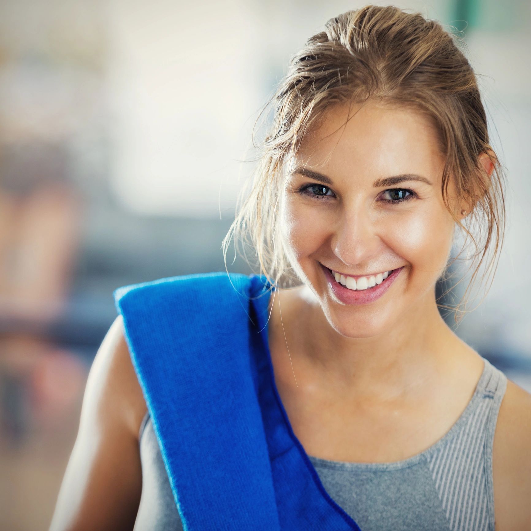 Portrait of a female fitness trainer smiling after a workout